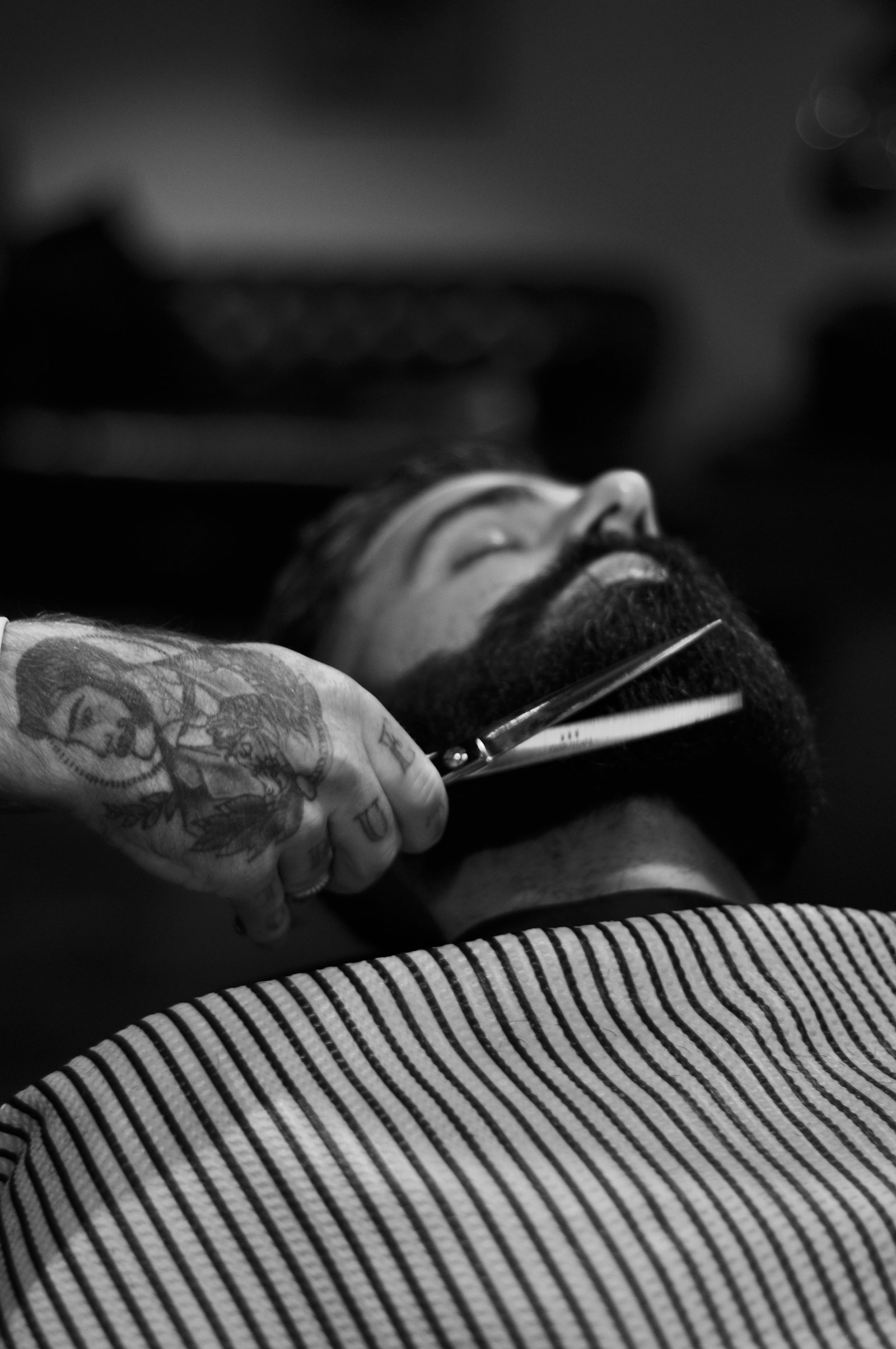 Scissor detail work on a full beard