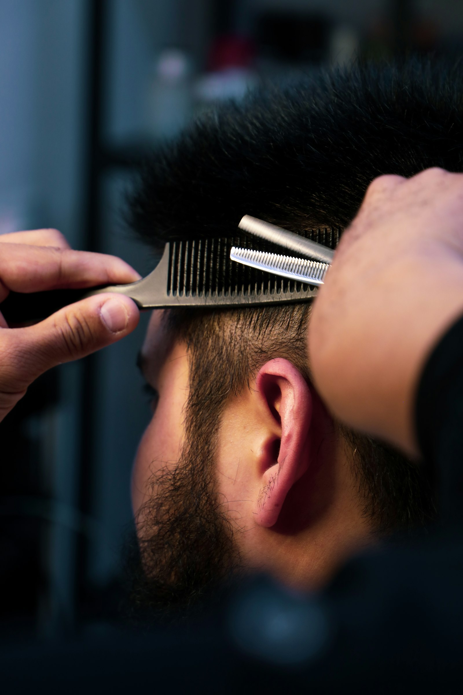 Comb and shears blending the top